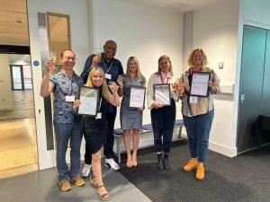 Staff from Open Mind Active and Wesport with their awards.